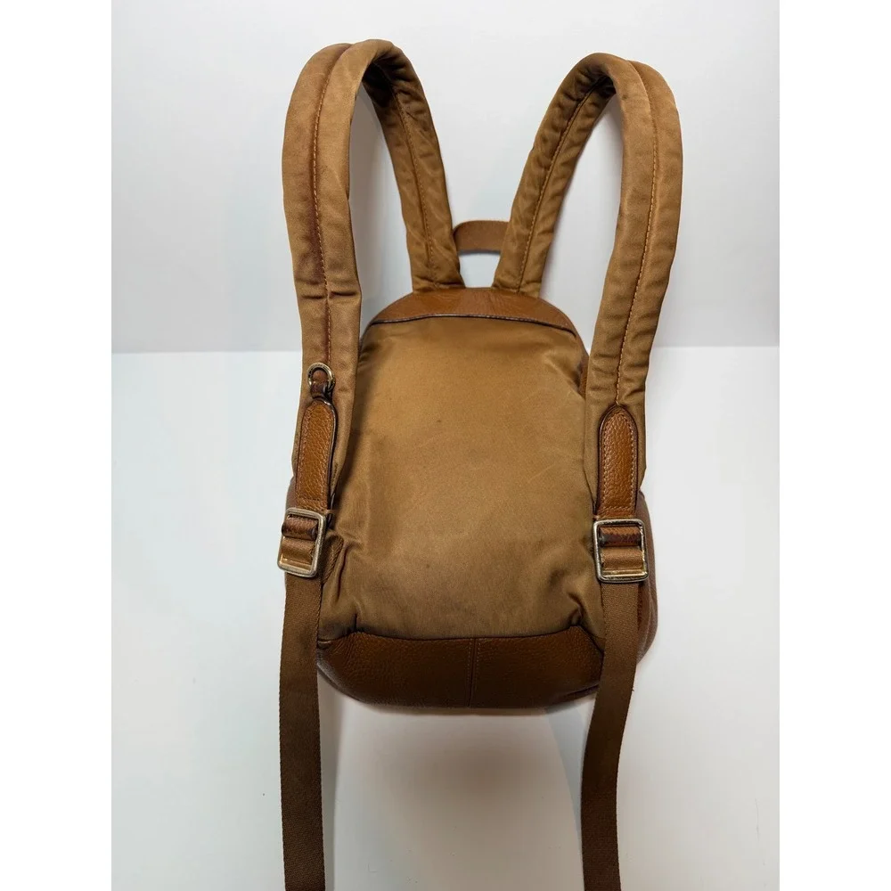Coach Saddle Leather Mini Charlie Backpack F38263 Pebble Leather Backpack.